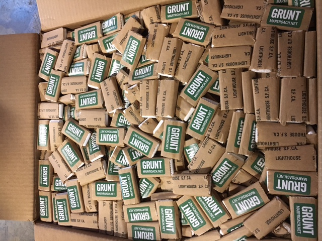 tissue packets with the word "Grunt" on them