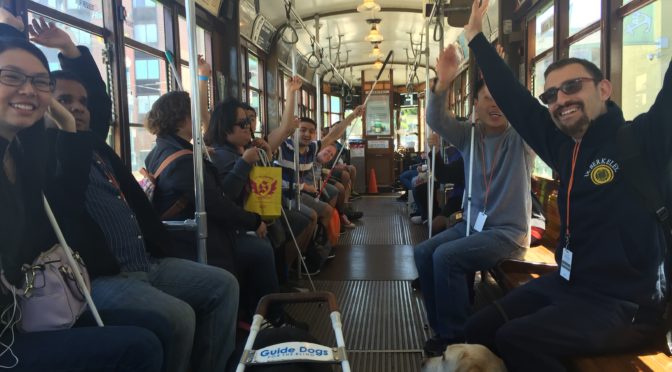 students on Muni F Line Car.