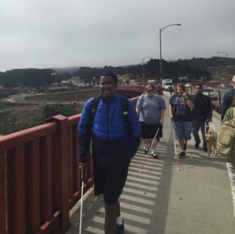 students cross golden gate bridge