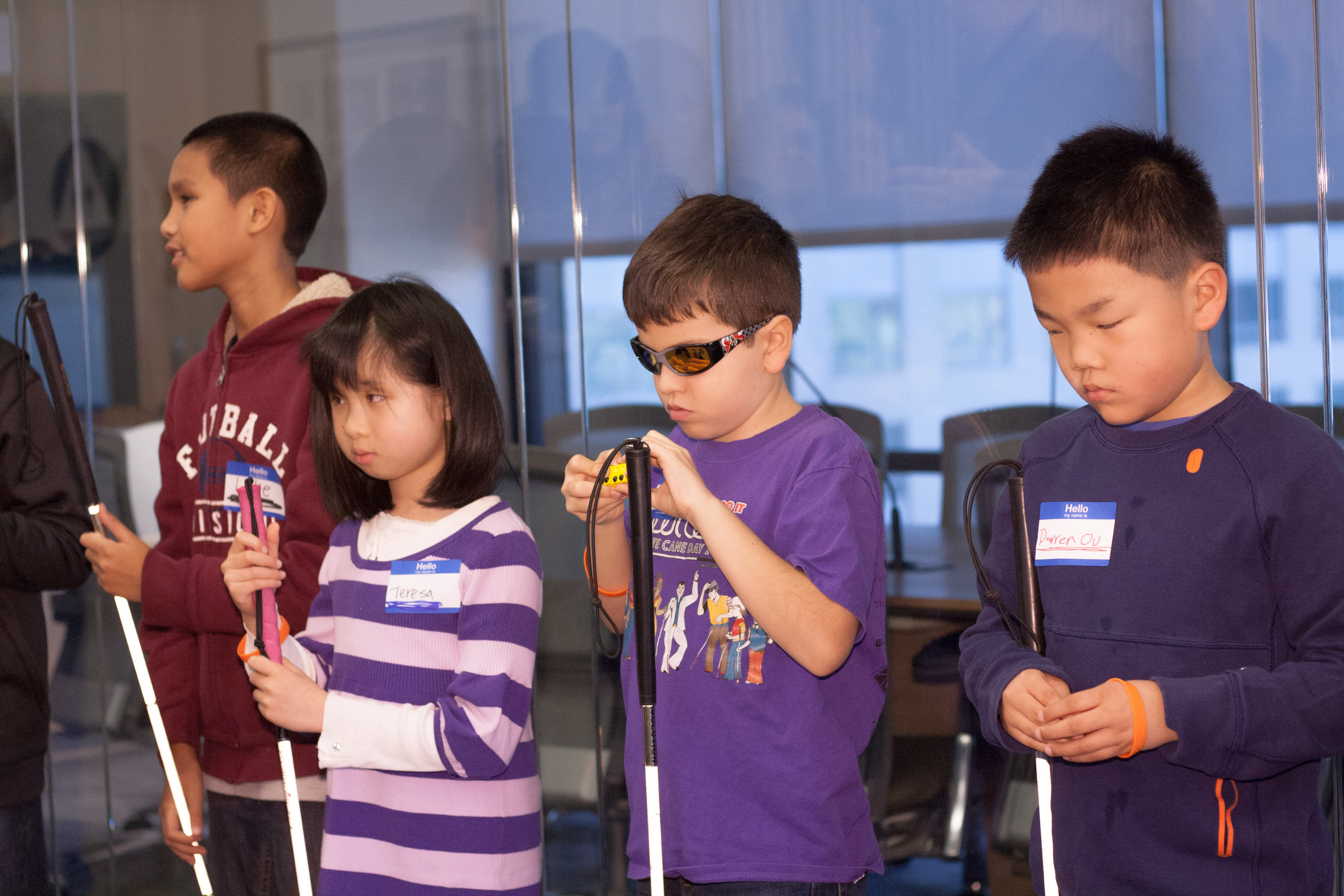 Four children stand in line before the 2017 Northern California Regional Braille Challenge opening procession.