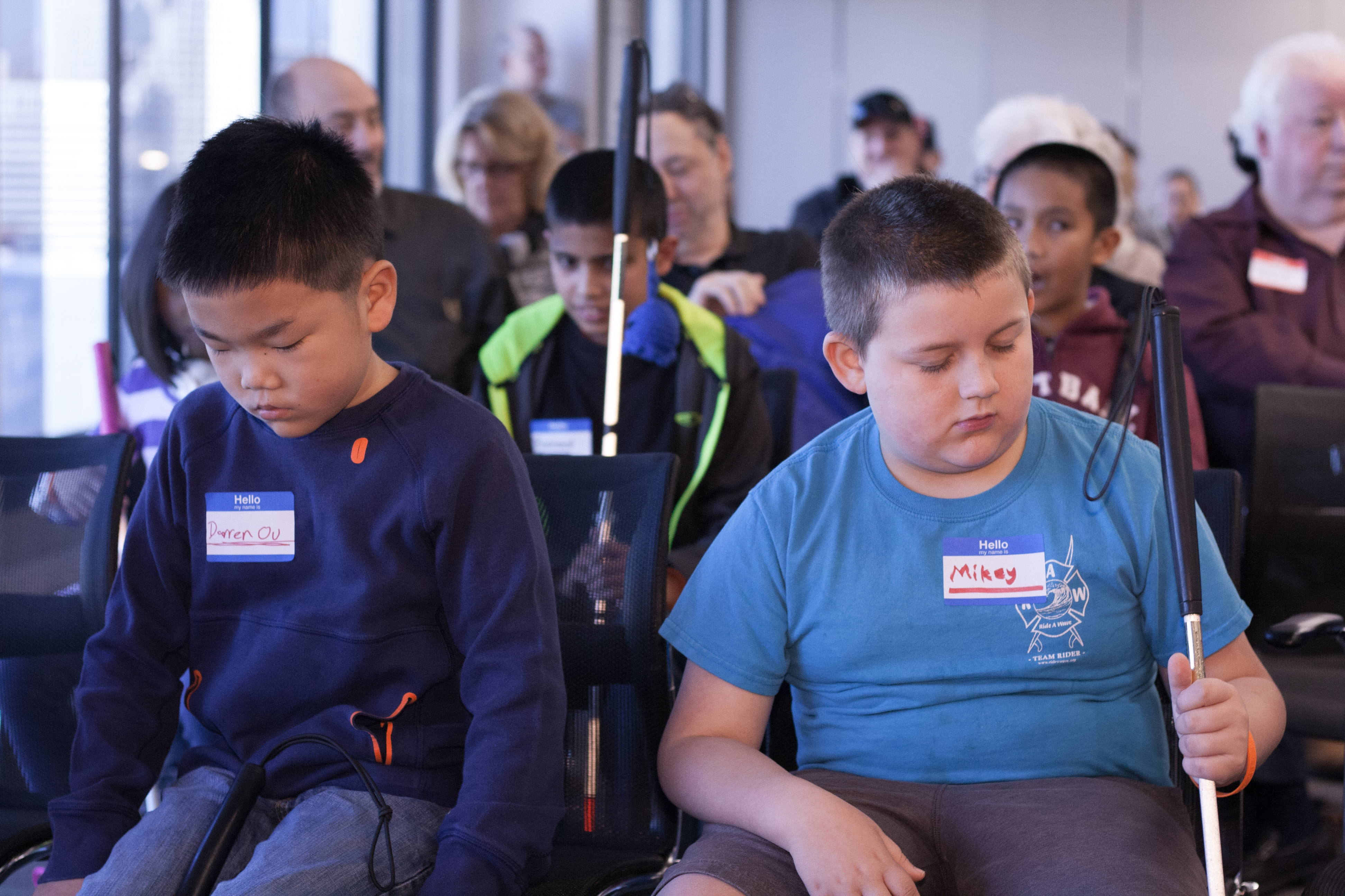 Braille challenge competitors Darren and Mikey sit together before the competition begins.