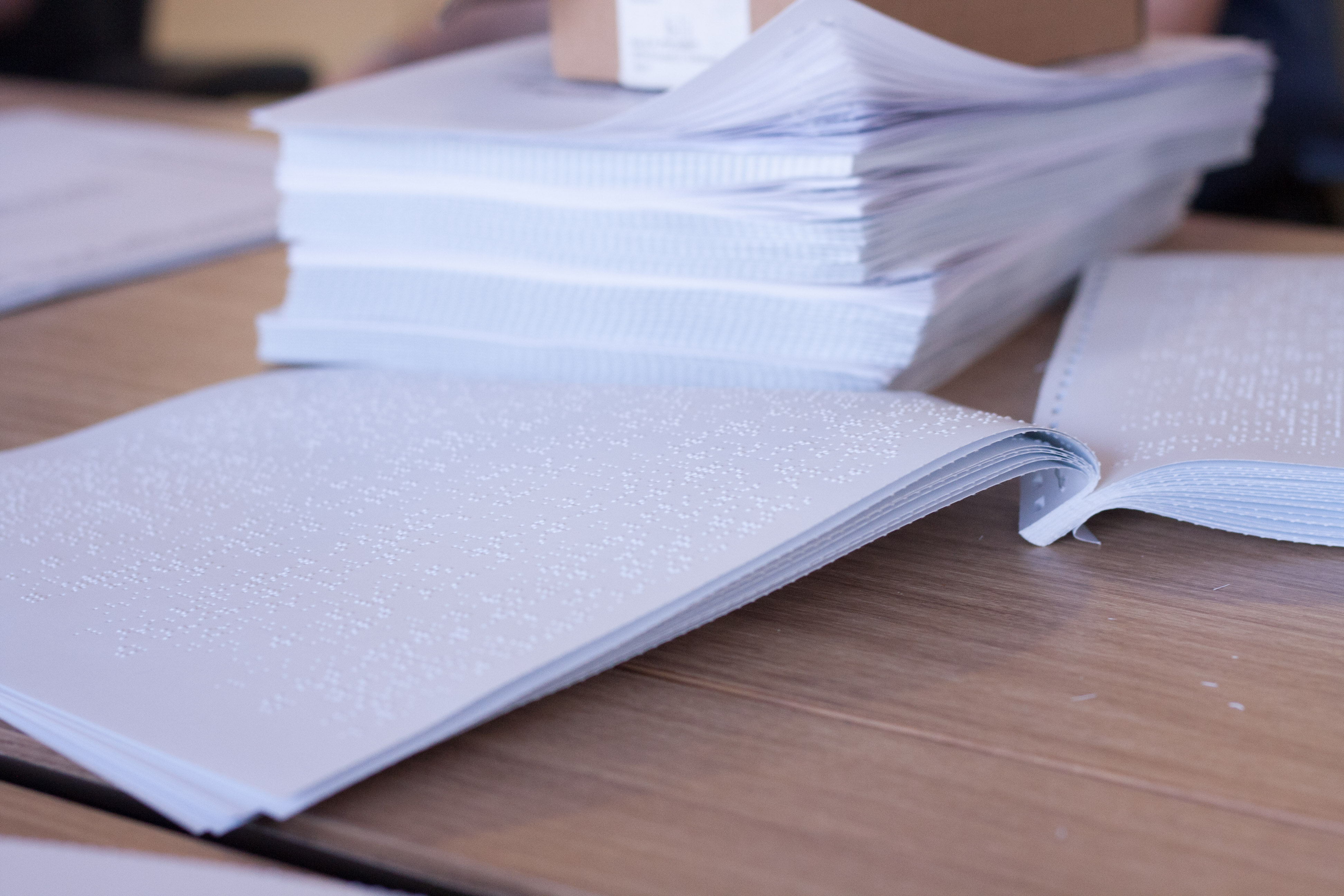 A stack of freshly brailled tests.