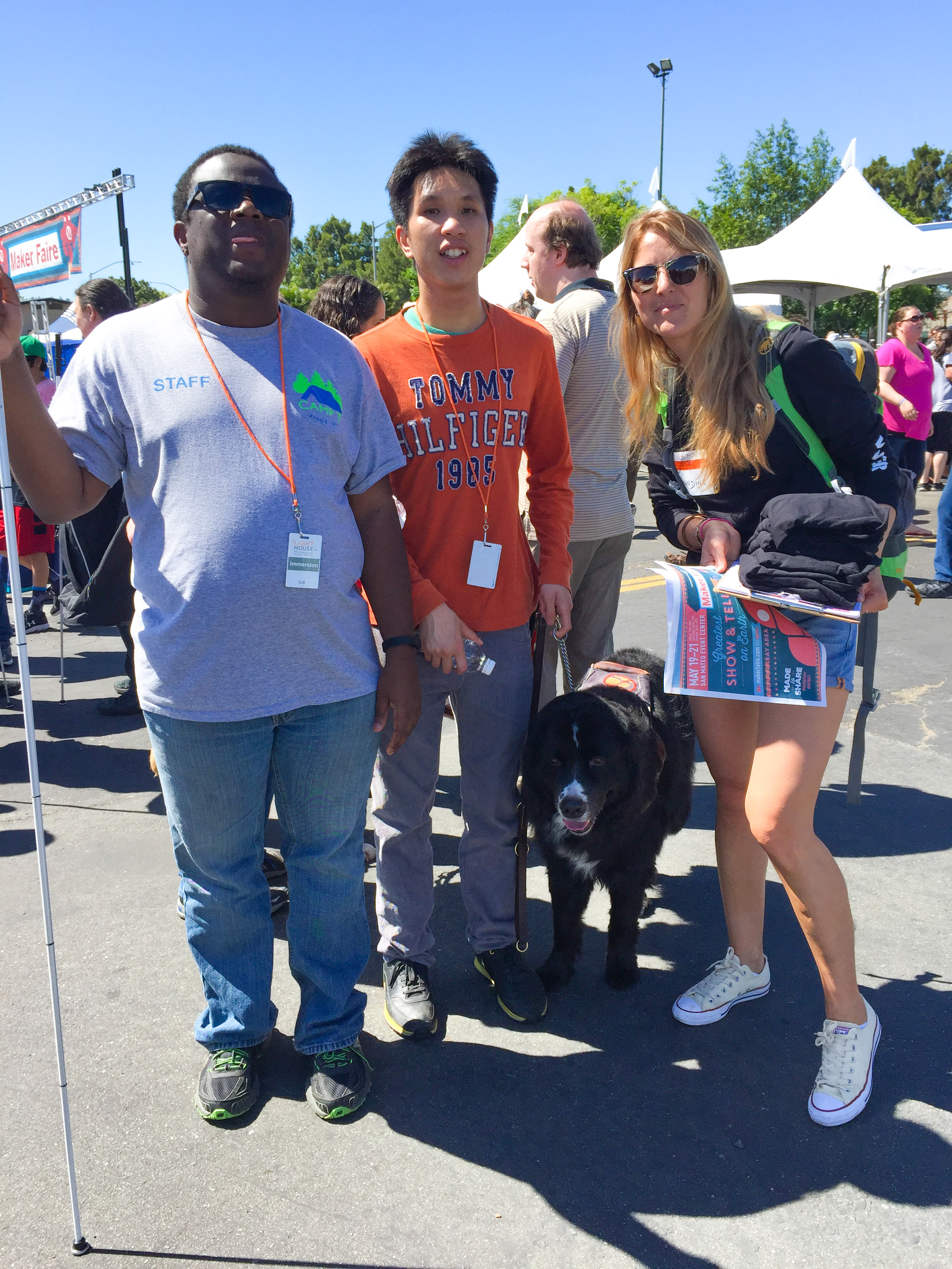 A group shot of two participants and an Oracle volunteer.