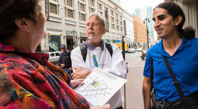 Holman Prizewinner Penny Melville-Brown uses a tactile map of 1155 Market Street during a walking tour of downtown San Francisco