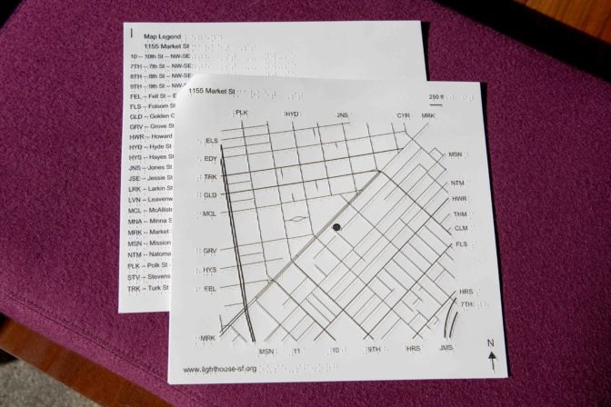 An ink-print and tactile map of the streets around LightHouse Headquarters, plus a legend showing street names.