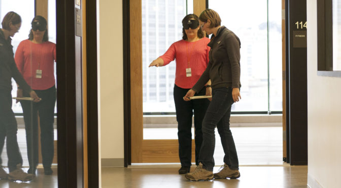 LightHouse Orientation and Mobility Instructor Katt Jones works with a student during an Immersion Training.