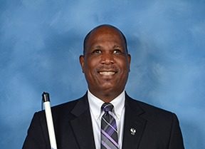 Anil Lewis headshot