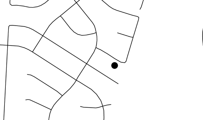 Map segment depicting a point of interest on a loop with multiple cross-streets