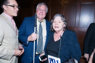 A trio of Gala attendees, including LightHouse CEO Bryan Bashin, stand smiling.