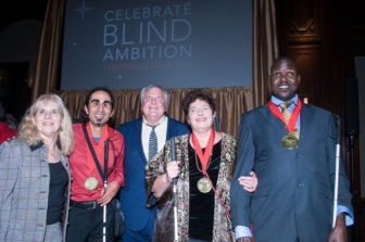 2017 Holman Prizewinners stand with LightHouse CEO Bryan Bashin.