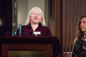 A Gala speaker stands at the podium.