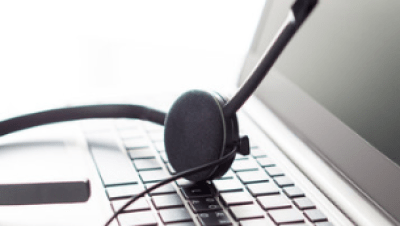 A laptop and headphones
