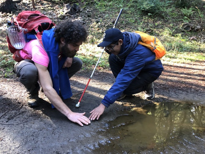 A Blind camper learning about the nature of mud during EHC summer session