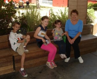 Family outside dining hall.