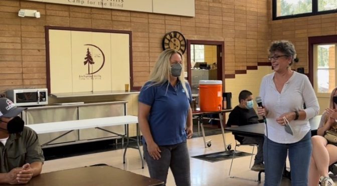PG&E archaeologists Jennifer Darcangelo and Leslie Sakowicz, with Scott Gabaldon looking on.