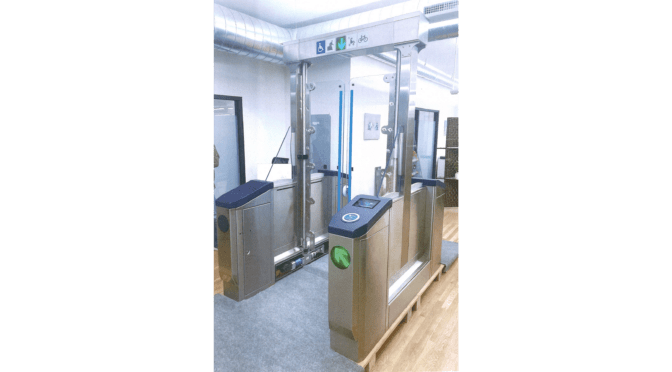 Rendering of the new accessible fare gate at a BART station with five foot high clear swing doors