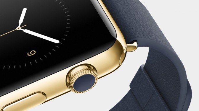 a gold-plated Apple Watch with deluxe black leather band and classic clock face