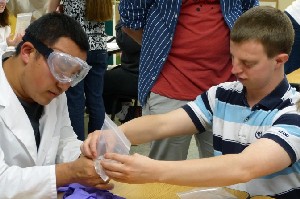Chemist Hoby Wedler works with student Jimmy Cong during a past session of Chemistry Camp