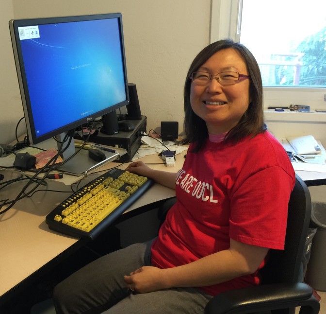 Jessica Phu sits at her computer
