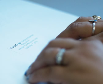 Female hands reading Braille