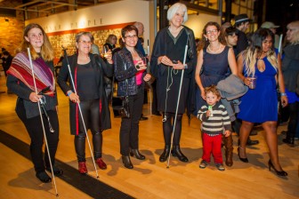 several prominent female members of the blidnness community pose for the camera