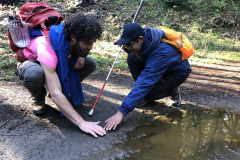 A blind camper learning about the nature of mud during the EHC summer session.