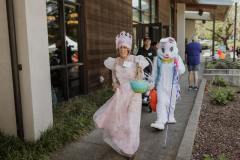 Glinda the Good Witch and Sunny the Bunny walking through the GDB campus
